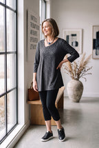 Made in Canada Sympli Asymmetrical 3/4 Sleeve Top | Size 14 on woman wearing leggings standing by window