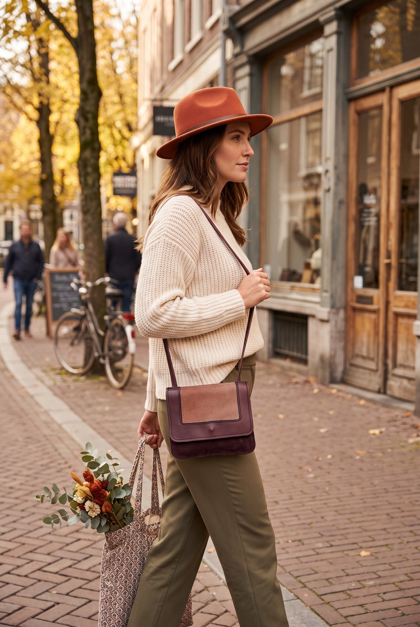 Vintage Leatherworks Crossbody Bag on woman walking outside