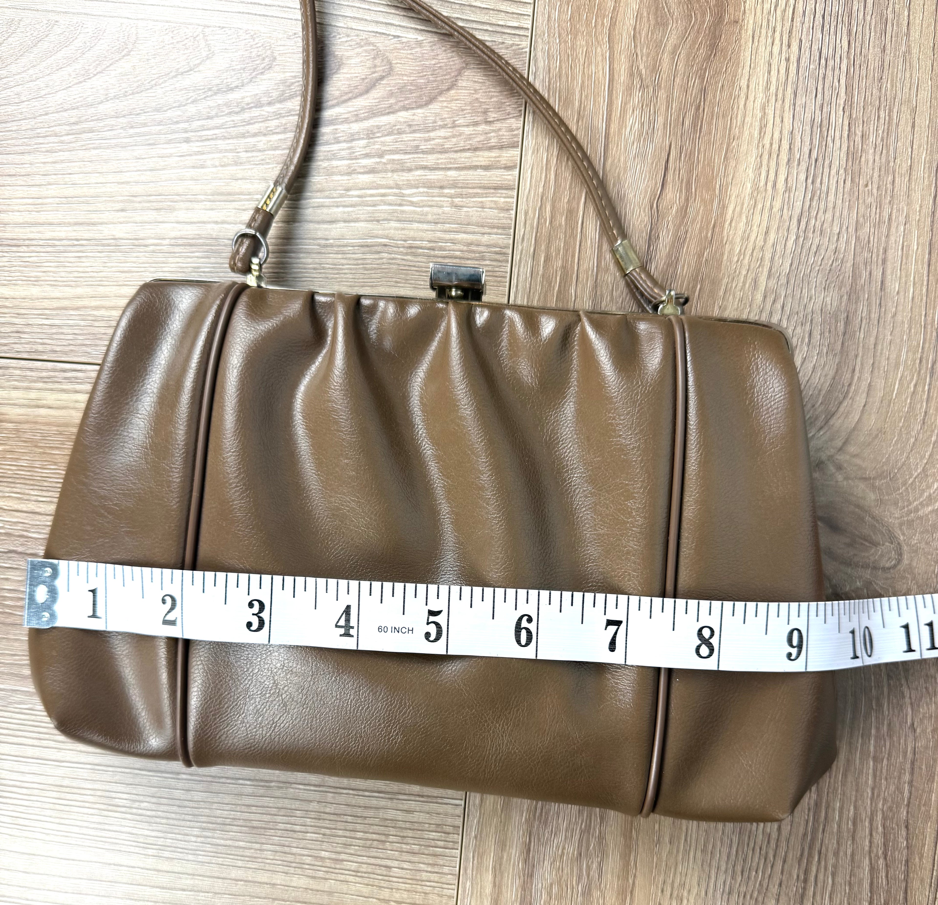 Made in USA Vintage Brown Leather Frame Purse  measuring 9" wide 