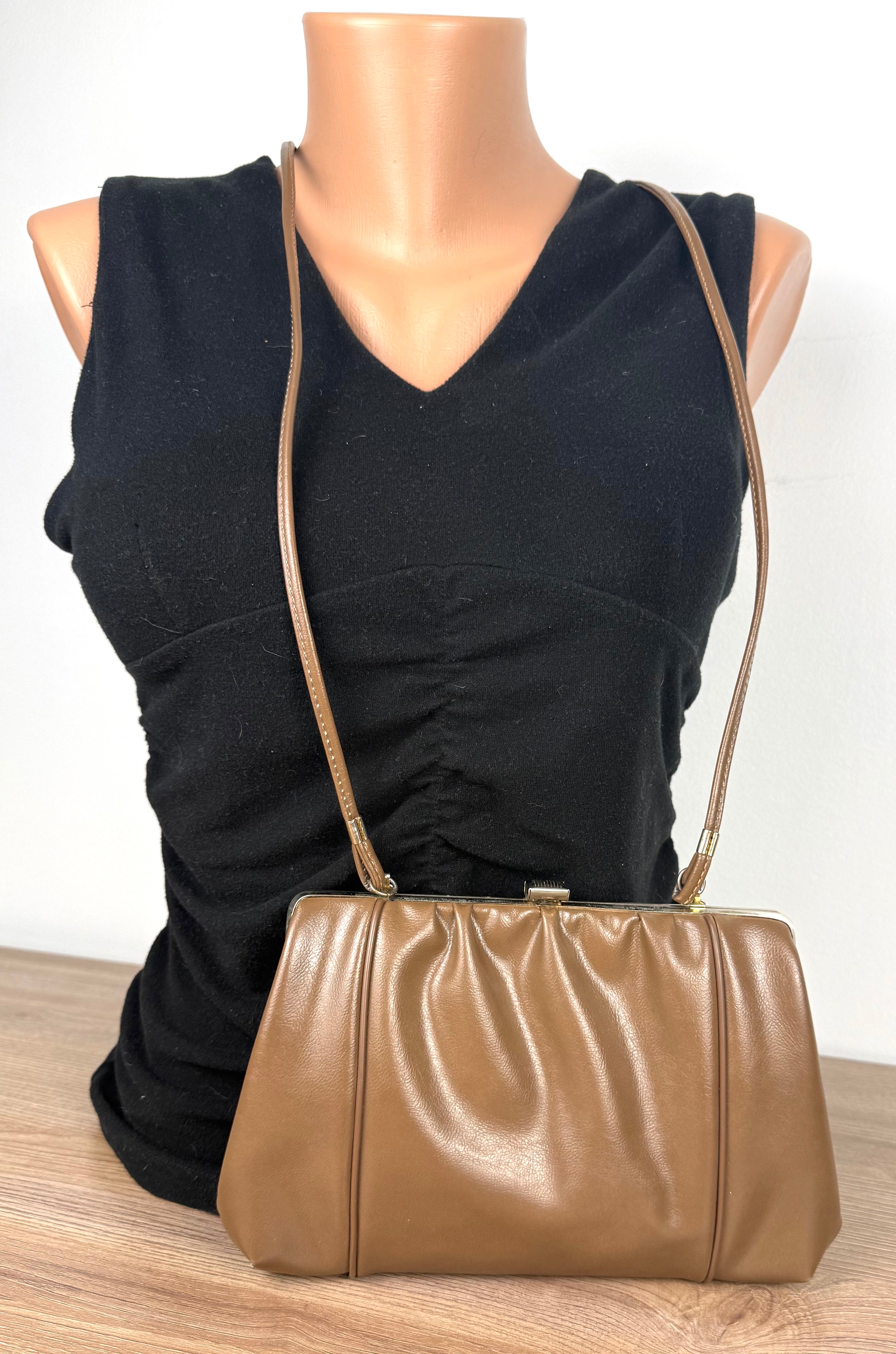 Made in USA Vintage Brown Leather Frame Purse  on mannequin to show size