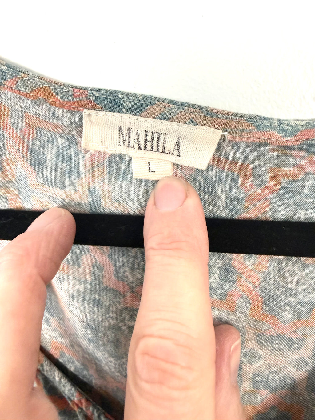 Mahla brand label showing size large sewn inside neckline of women’s boho blouse.