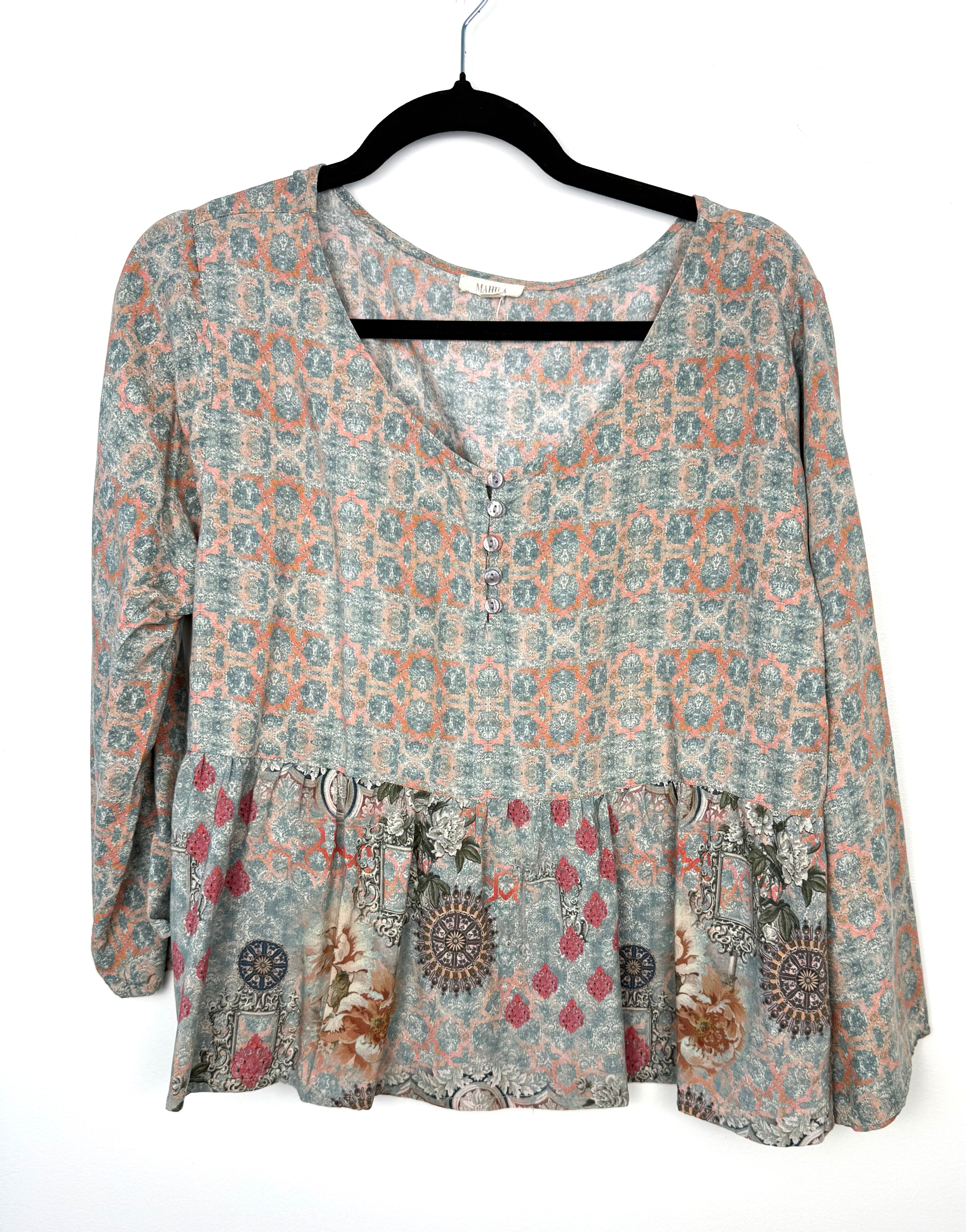 Mahla women’s boho peplum blouse in size large featuring a soft sage green and coral mixed print design with 3/4 sleeves and button front detail. Lightweight 100% modal fabric with flowy drape and relaxed fit. front view 
