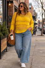 Maje Crochet Knit Sweater at Blue Sparrow Shop on larger woman walking with coffee outside 