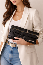 Matt & Nat Black Vegan Leather Clutch Bag at Blue Sparrow Shop on woman in blazer