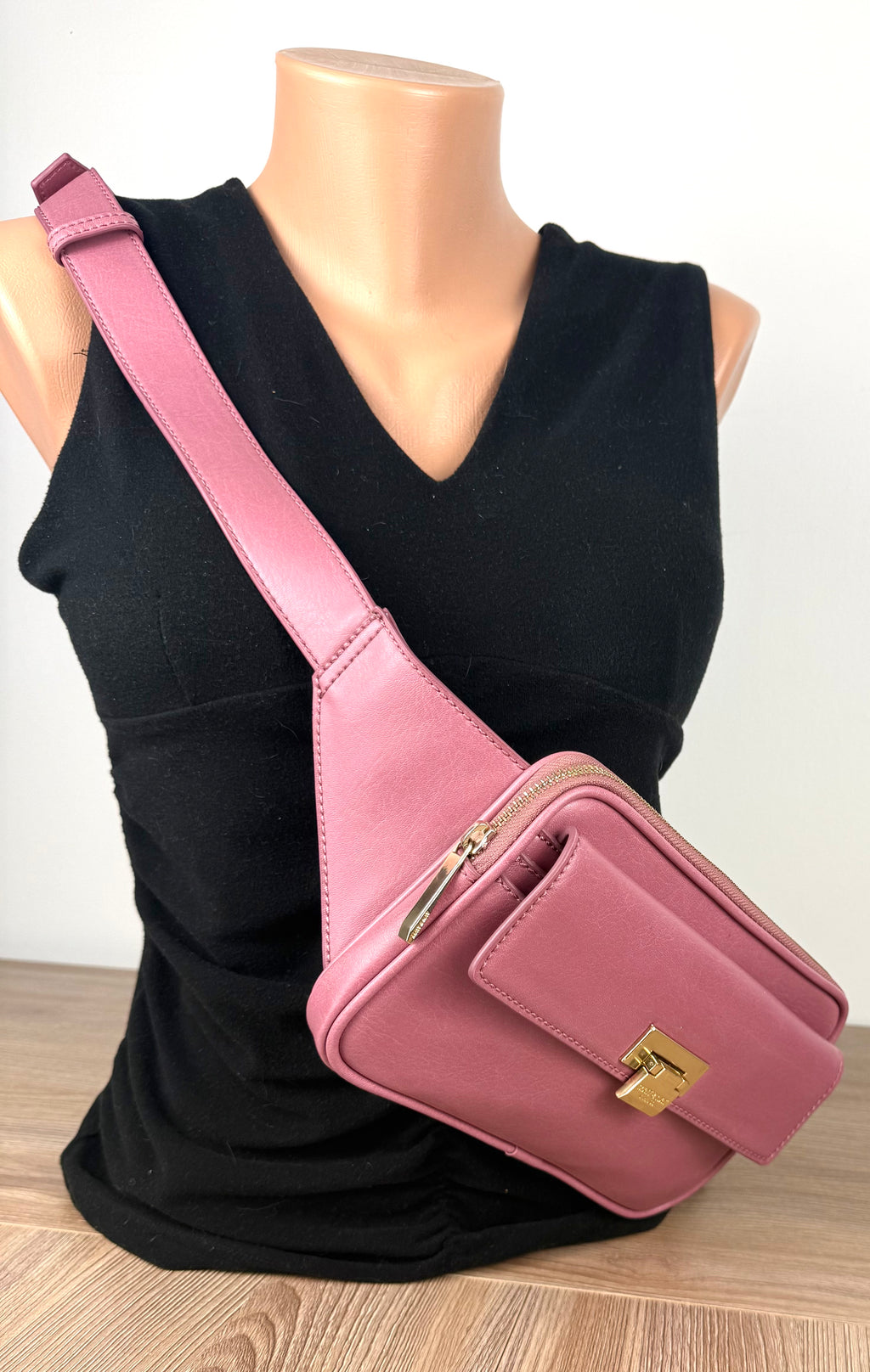 Matt & Nat Pink Belt Bag | Vegan Leather Crossbody Sling on mannequin to show size