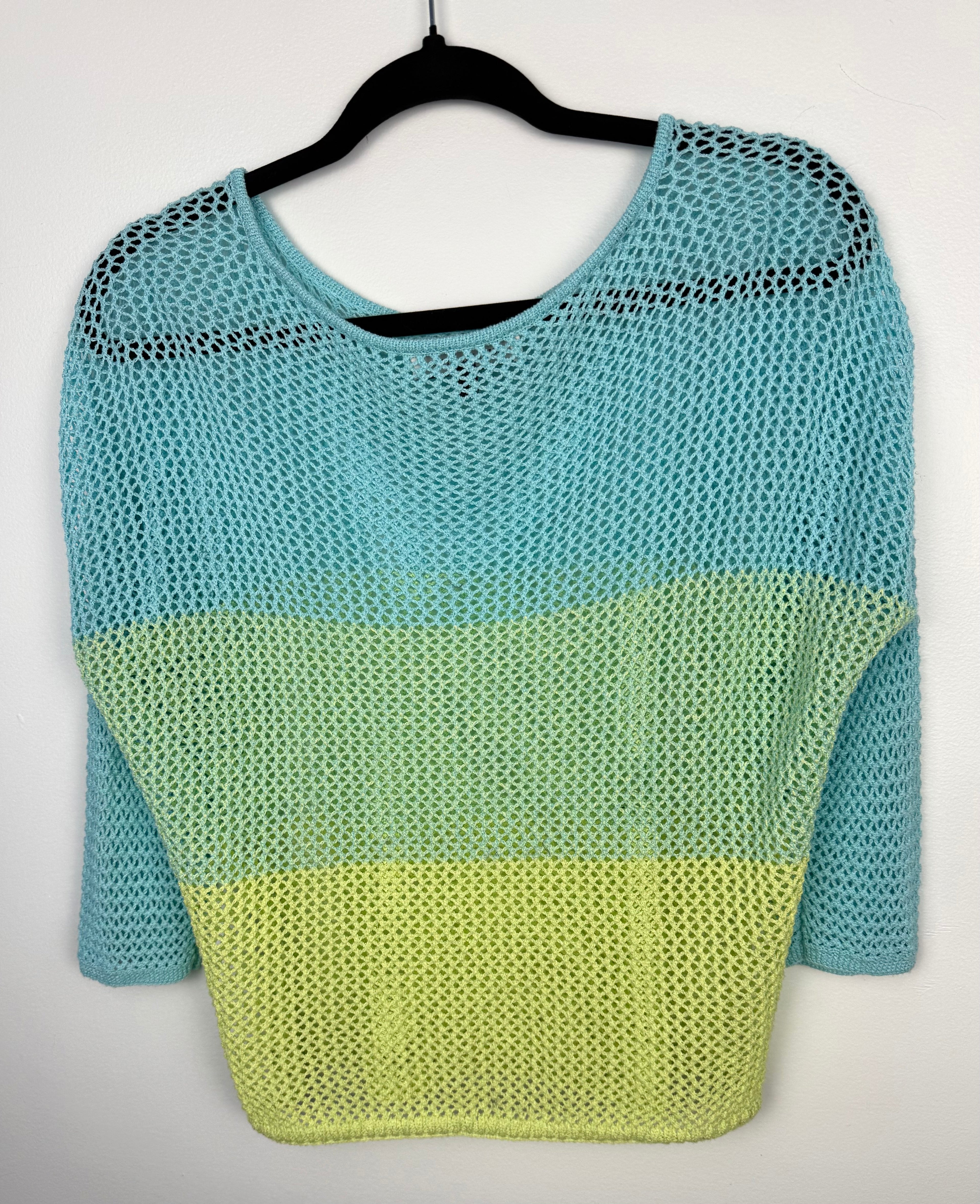 back of Melanie Lyne blue and green colourblock open knit sweater lightweight mesh pullover on hanger