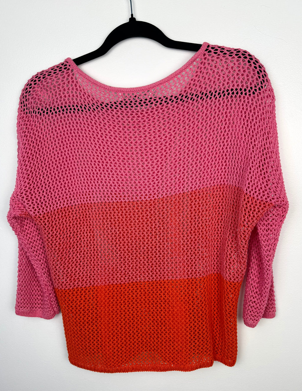 back of Melanie Lyne pink and red colourblock open knit sweater lightweight mesh pullover on hanger