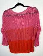 back of Melanie Lyne pink and red colourblock open knit sweater lightweight mesh pullover on hanger