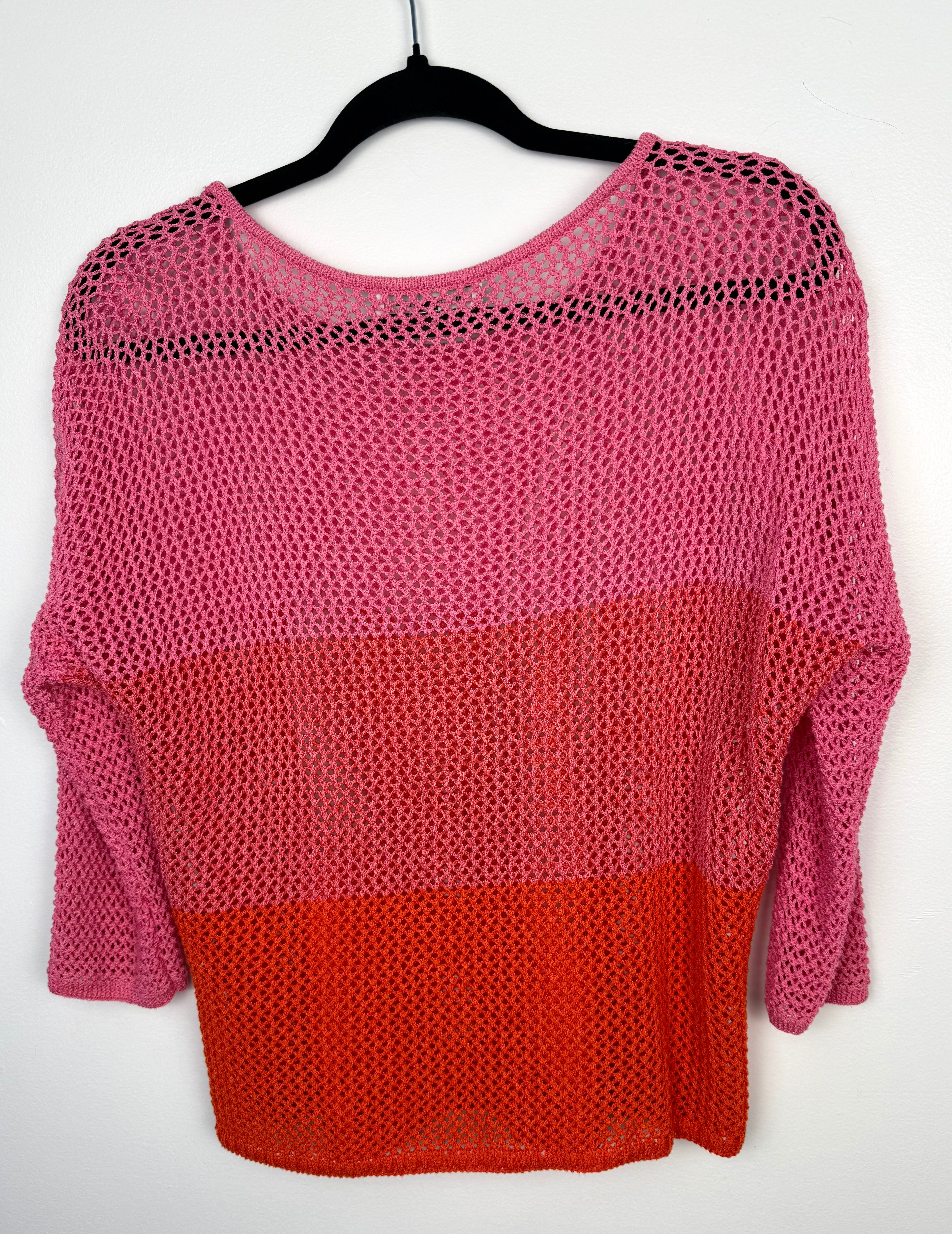 back of Melanie Lyne pink and red colourblock open knit sweater lightweight mesh pullover on hanger