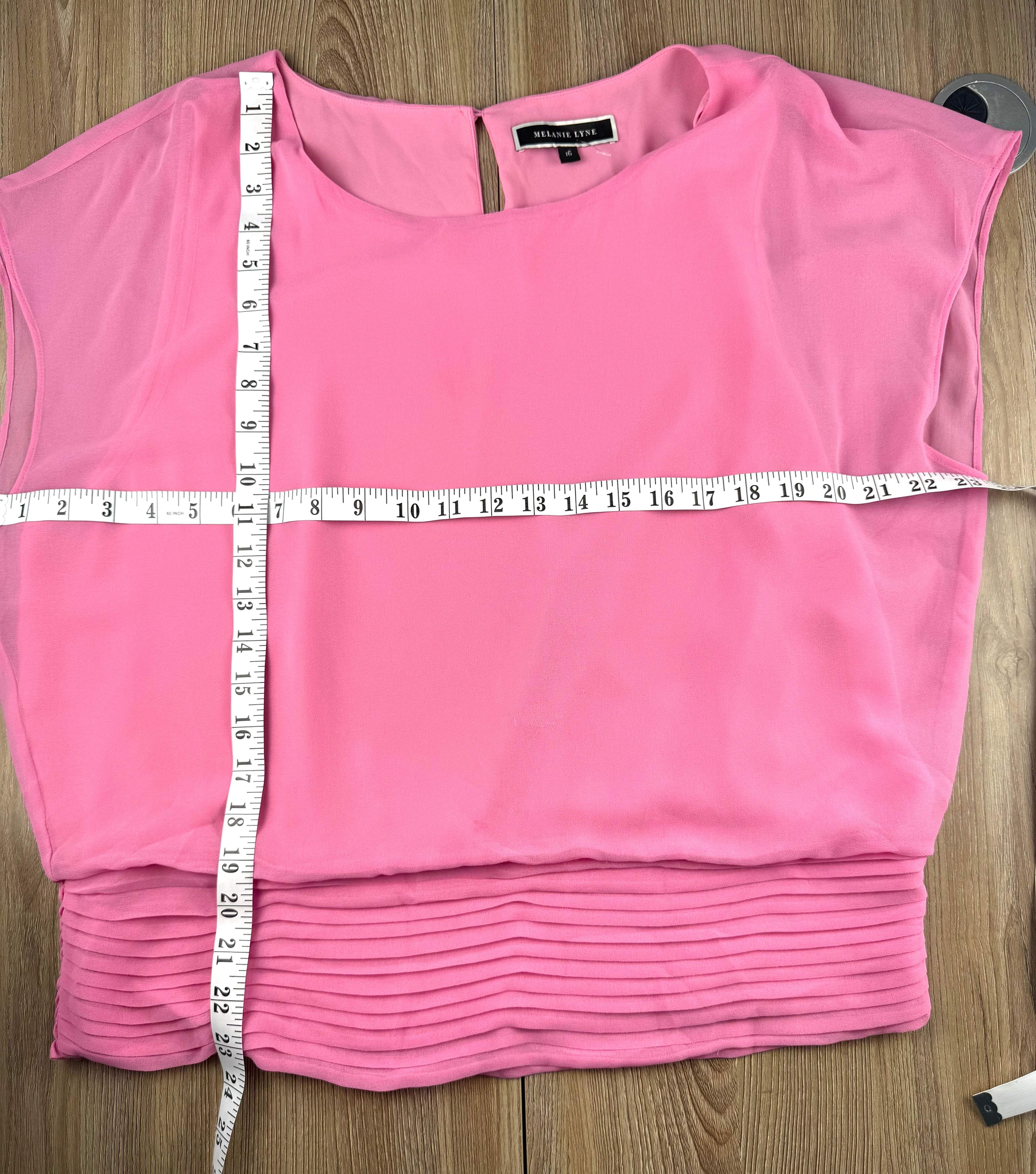 Melanie Lyne pink chiffon blouse with smocked waist and flutter sleeves measuring 46" bust 23" shoulder to hem