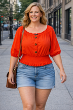 Melanie Lynn Smocked Waist Top | Size XL at Blue Sparrow Shop on woman walking outside
