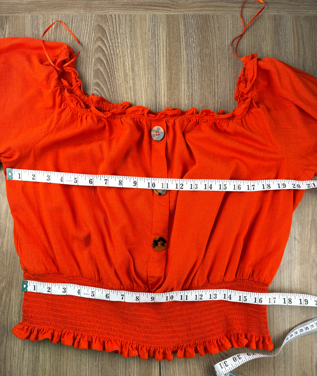 Melanie lyn smocked peasant top measuring 40" bust and 32" waist not extended