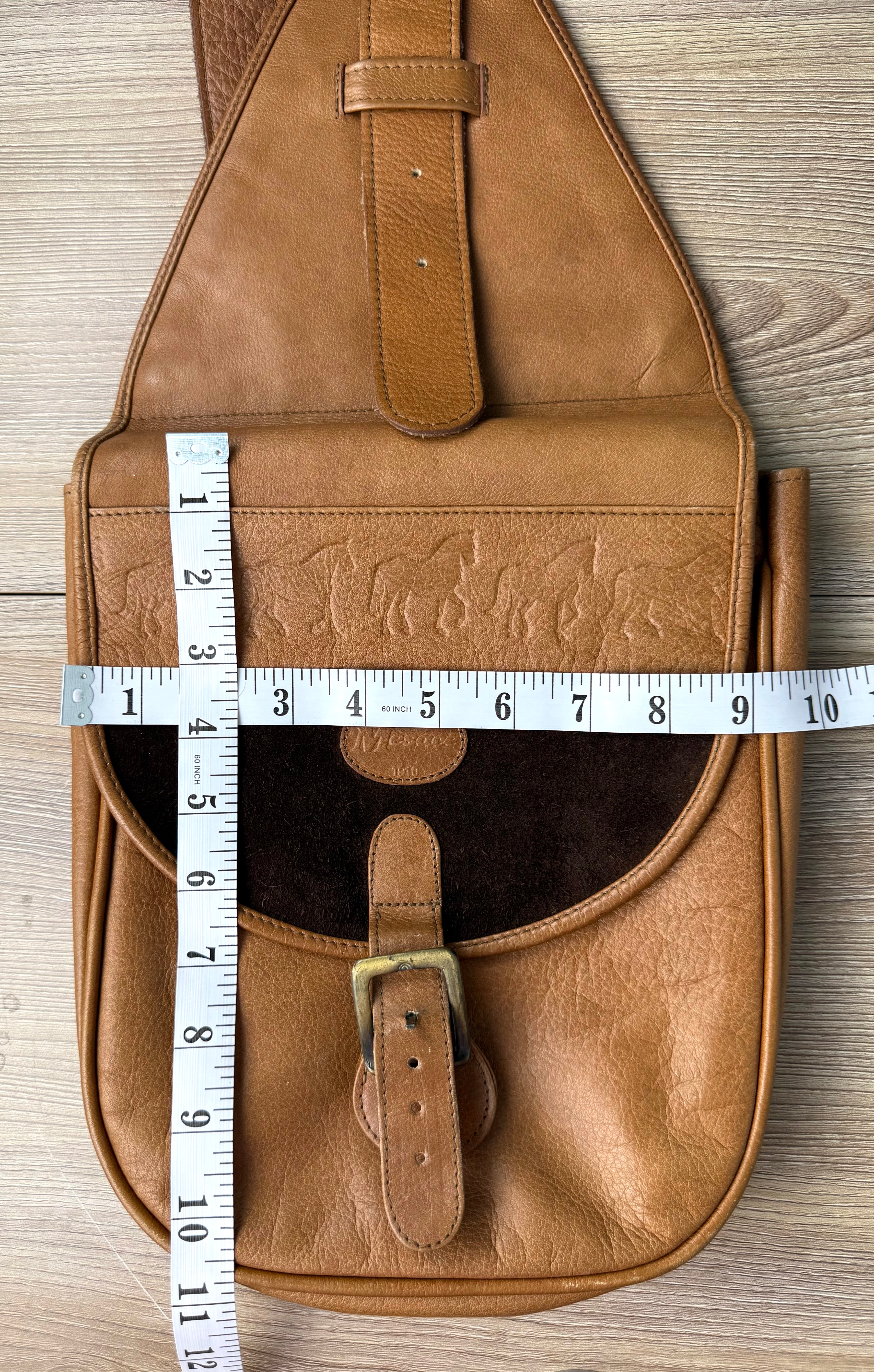 Mesace 1910 Cognac Leather Western Saddle Sling Bag measuring 10 wide and 10.5" deep approx 