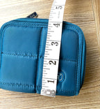 NWOT Lug Double Zip Wallet measuring about 4" high
