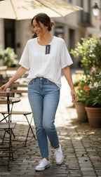 NWT 100% Cotton Embroidered Button-Front Top | Size M at Blue Sparrow Shop  on woman outside