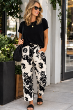 NWT LuLaRoe Wide Leg Pants in black and white at Blue Sparrow Shop on woman walking outdoors