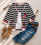 oversized_cardigan_striped_with_sequinned_decals_at_Blue_Sparrow_Shop in flatlay with jeans and shoes