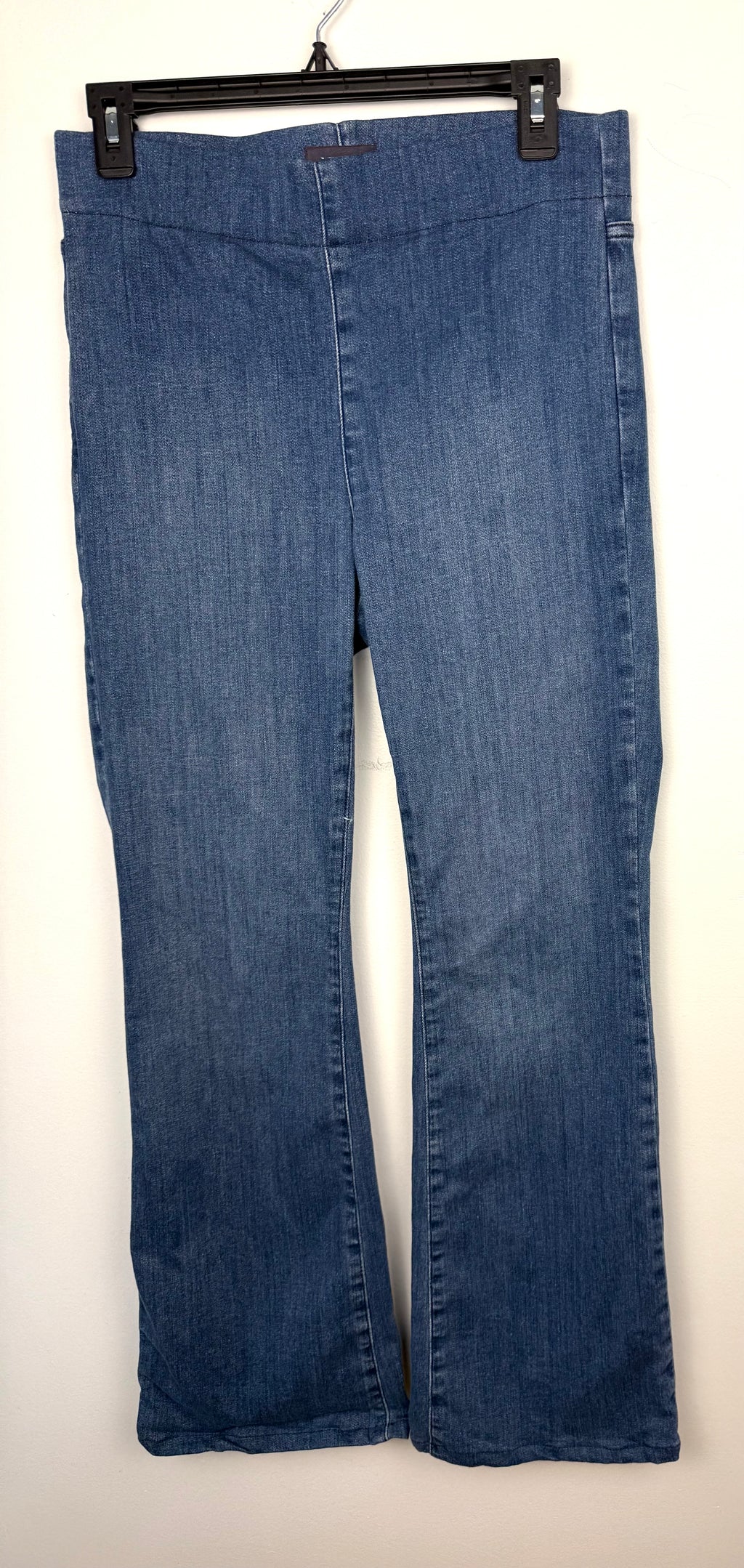 NYDJ Foundry Pull-On Bootcut Jeans – Medium Wash Stretch Denim Jeans on hanger