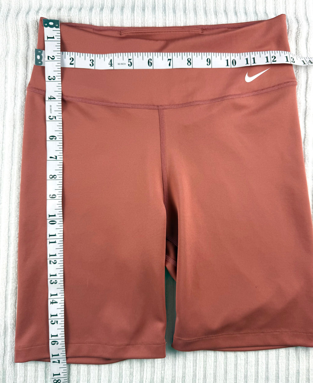 Nike Dri-FIT Terracotta Biker Shorts | Size M  at Blue Sparrow Shop measuring 26" waist and 17" waist to hem 