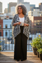 Nine West Paisley Kimono Cardigan | Boho Layering Piece | Resort Wear Cover Up at Blue Sparrow Shop on woman standing outside on patio having coffee