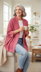 Olsen 100% Cotton Open Mesh Knit Cardigan at Blue Sparrow Shop on woman sitting on edge of couch 