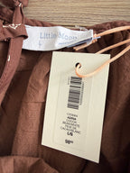Original retail $98 shown on hang tag on little moon Aritzia dress