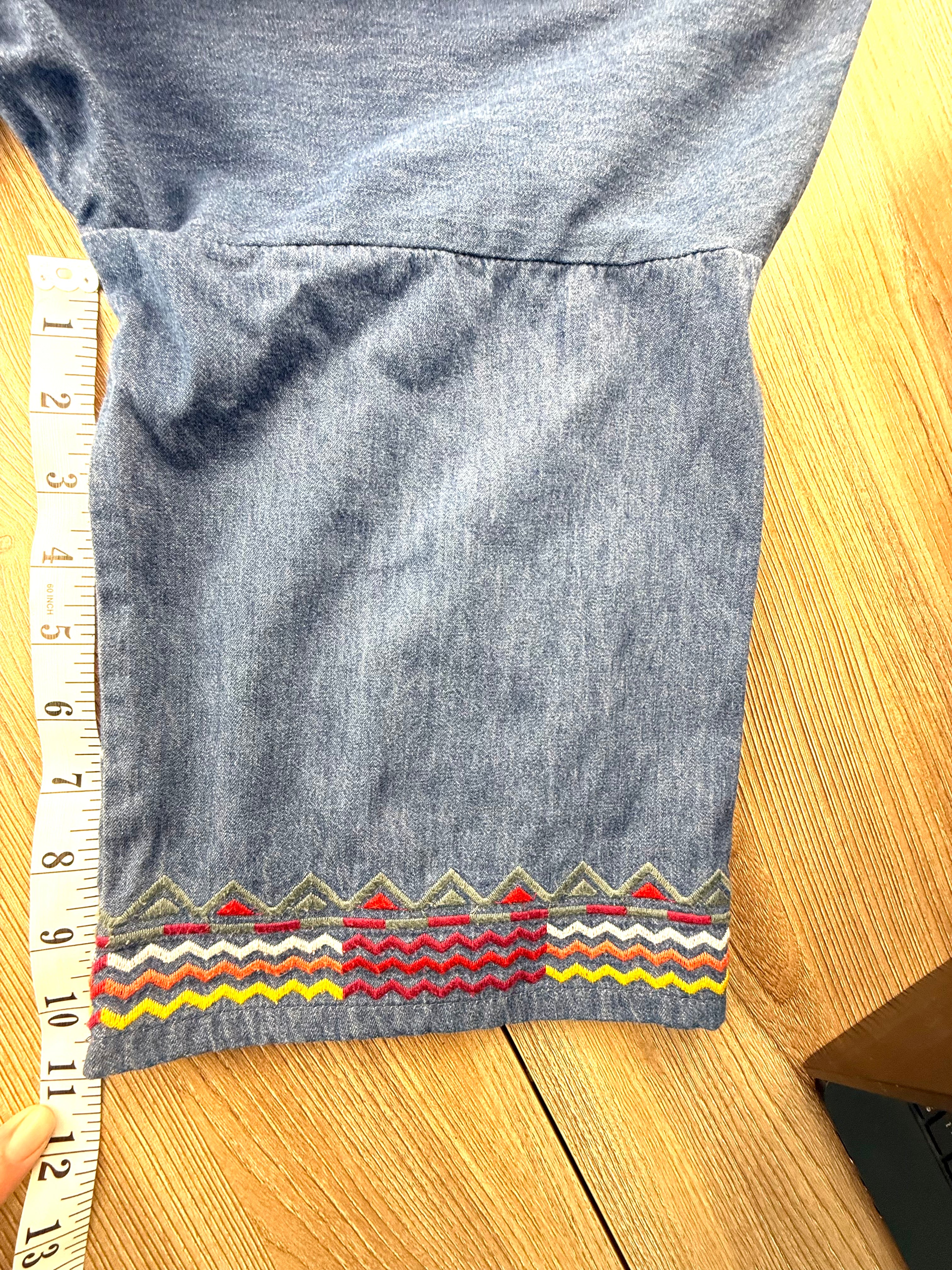 Oversize denim jacket measuring 11" sleeve length 