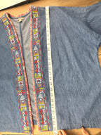 Oversize denim jacket measuring 25" shoulder to hem 