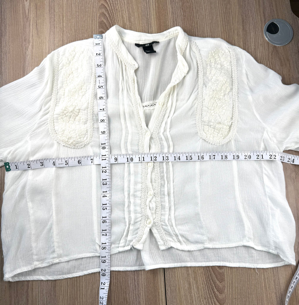 Oversized H & M boho peasant blouse measuring 19" shoulder to hem and 46" bust 