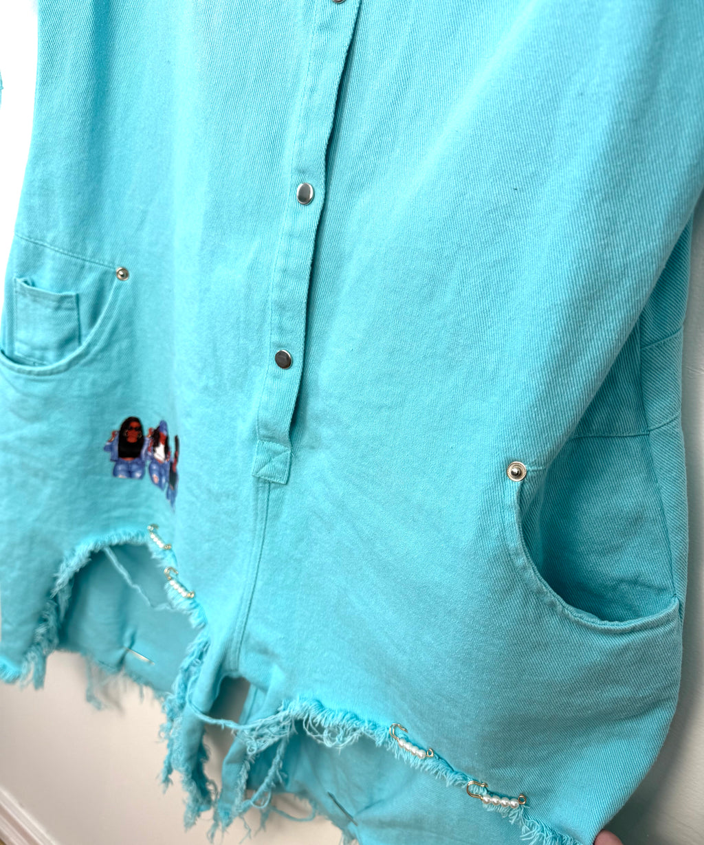 Oversized Turquoise denim romper close up of legs 