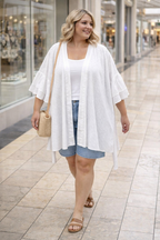 Oversized White Eyelet Kimono | Size 4X at Blue Sparrow Shop on woman walking in mall