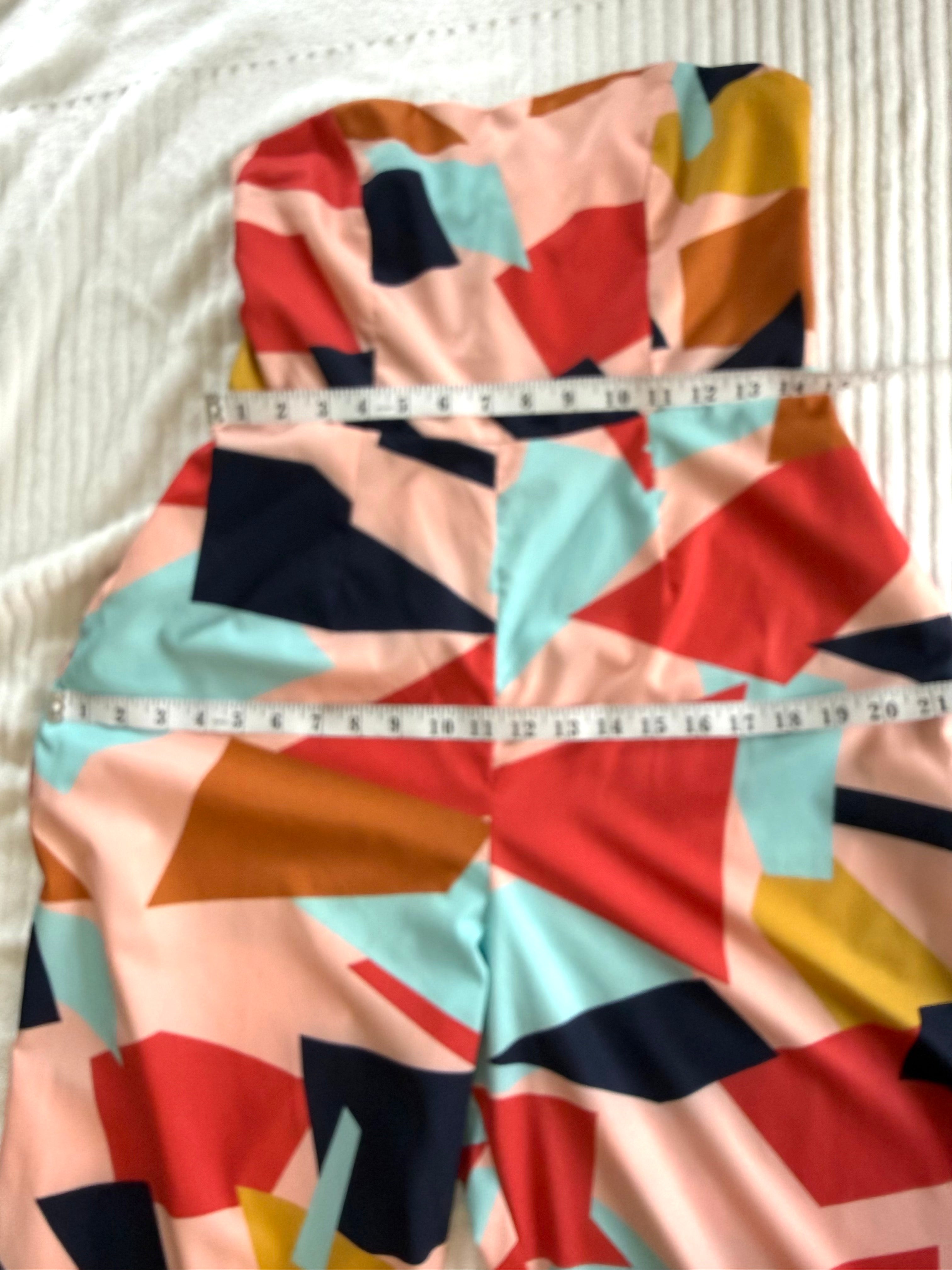 PAPILLON Geometric Print Strapless Jumpsuit at Blue Sparrow Shop measuring  28" waist when relaxed and 44" hips 