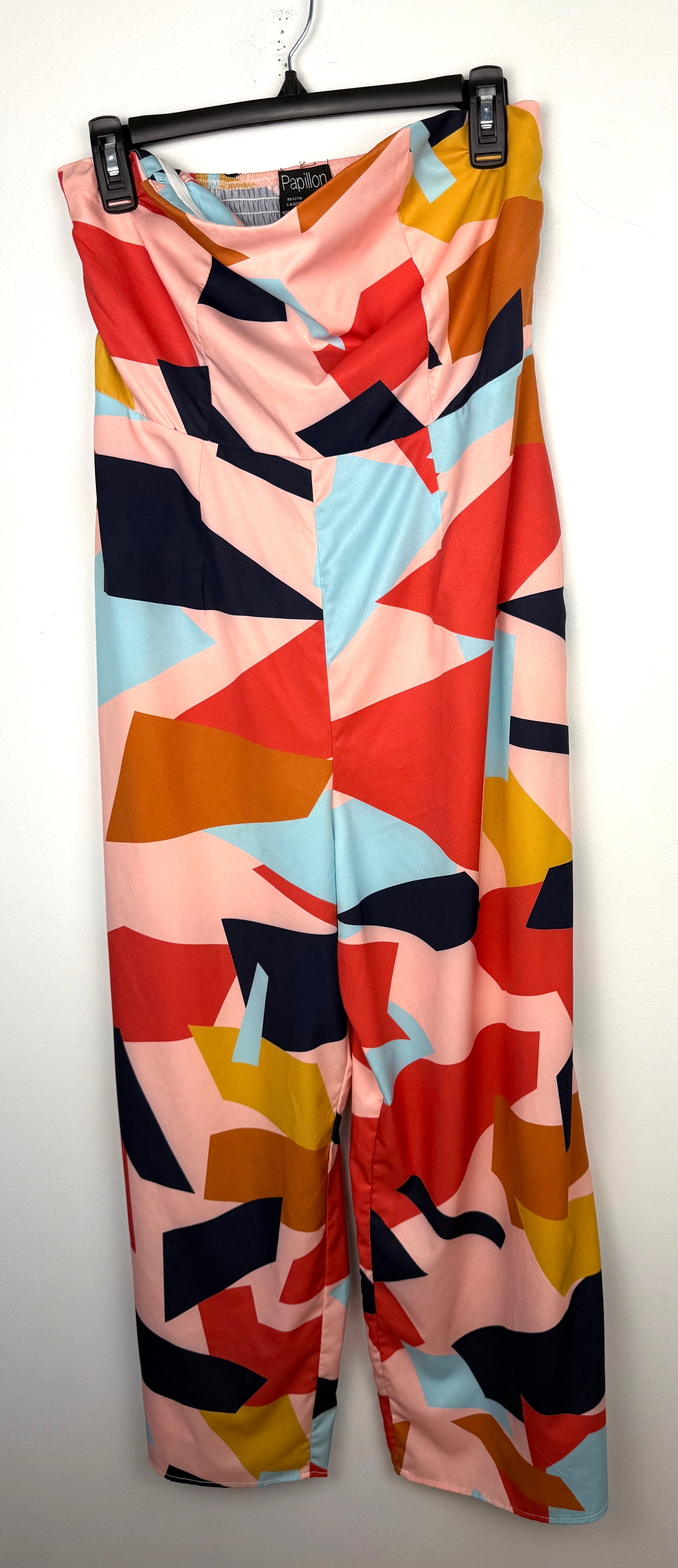 PAPILLON Geometric Print Strapless Jumpsuit at Blue Sparrow Shop on hanger