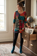 Papillion Tunic Sweater Dress | Size M on ai woman reaching for something in a drawer 