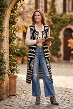 Parkhurst Long Black & Cream Geometric Knit Vest | Size M/L on woman outside with book in hand