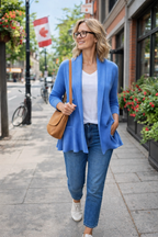Peplum waist Royal Blue Knit Cardigan | Size L at Blue Sparrow Shop on woman walking outside