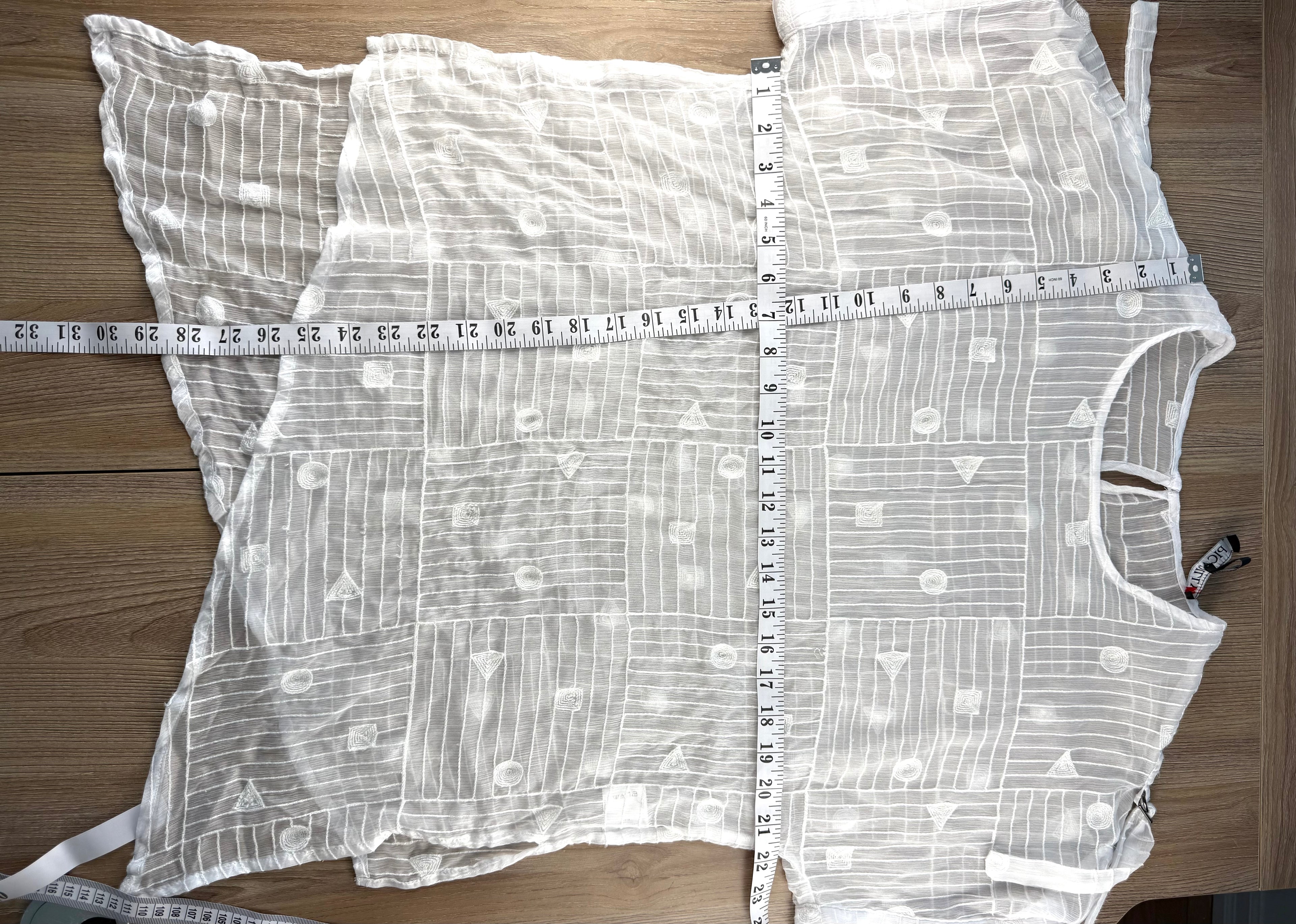 Picadilly Canada Textured Sheer Top measuring 44" bust and 25" - 29" asymmetrical hem 