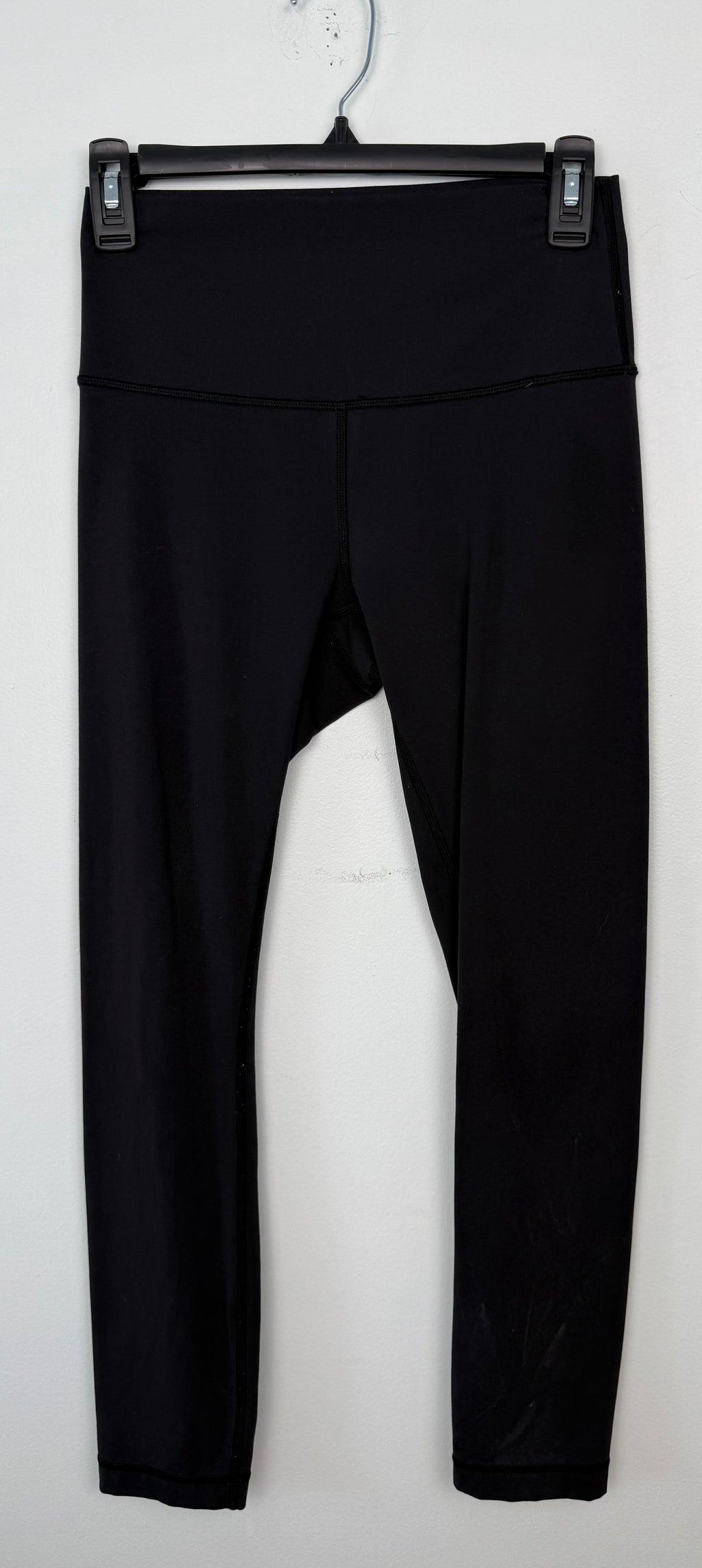 Pre-loved Lululemon Black High Waisted Leggings | Size 6 at Blue Sparrow Shop on hanger