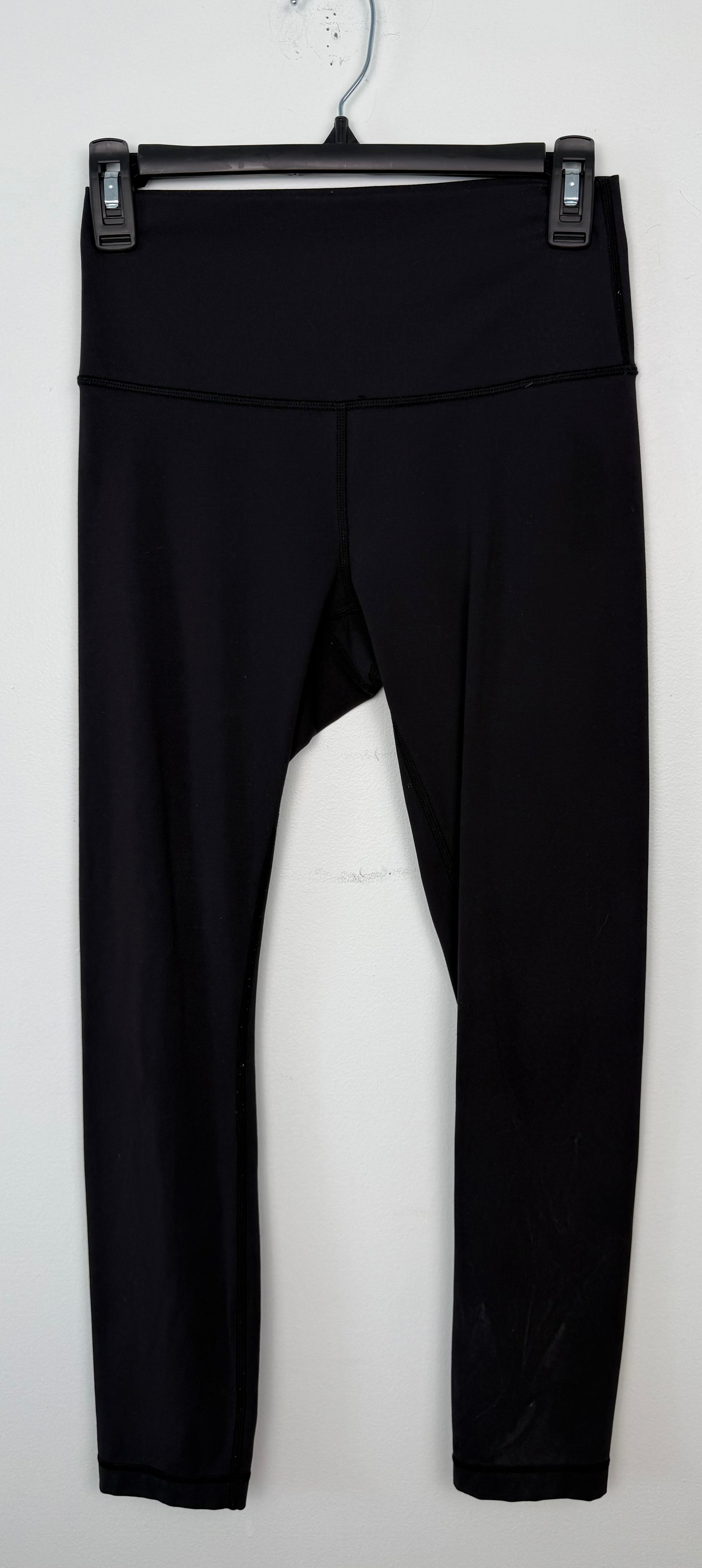 Pre-loved Lululemon Black High Waisted Leggings | Size 6 at Blue Sparrow Shop on hanger