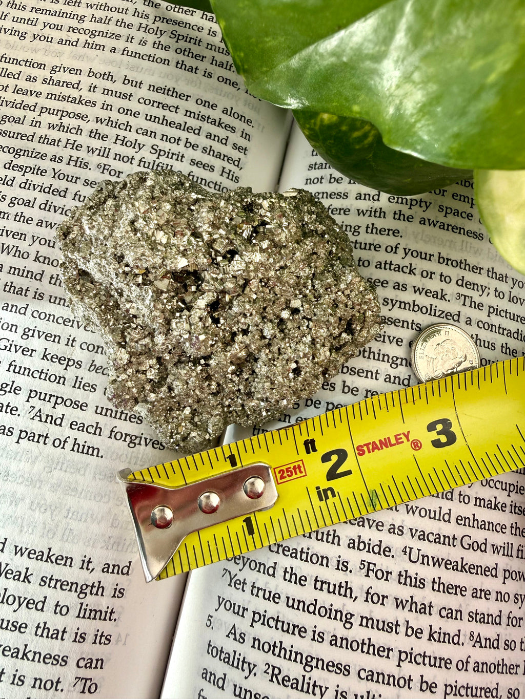 Pyrite with measuring tape showing it to be about t3 inches long