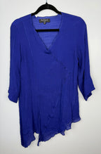 Red Coral Royal Blue Asymmetrical Tunic Top  on hanger