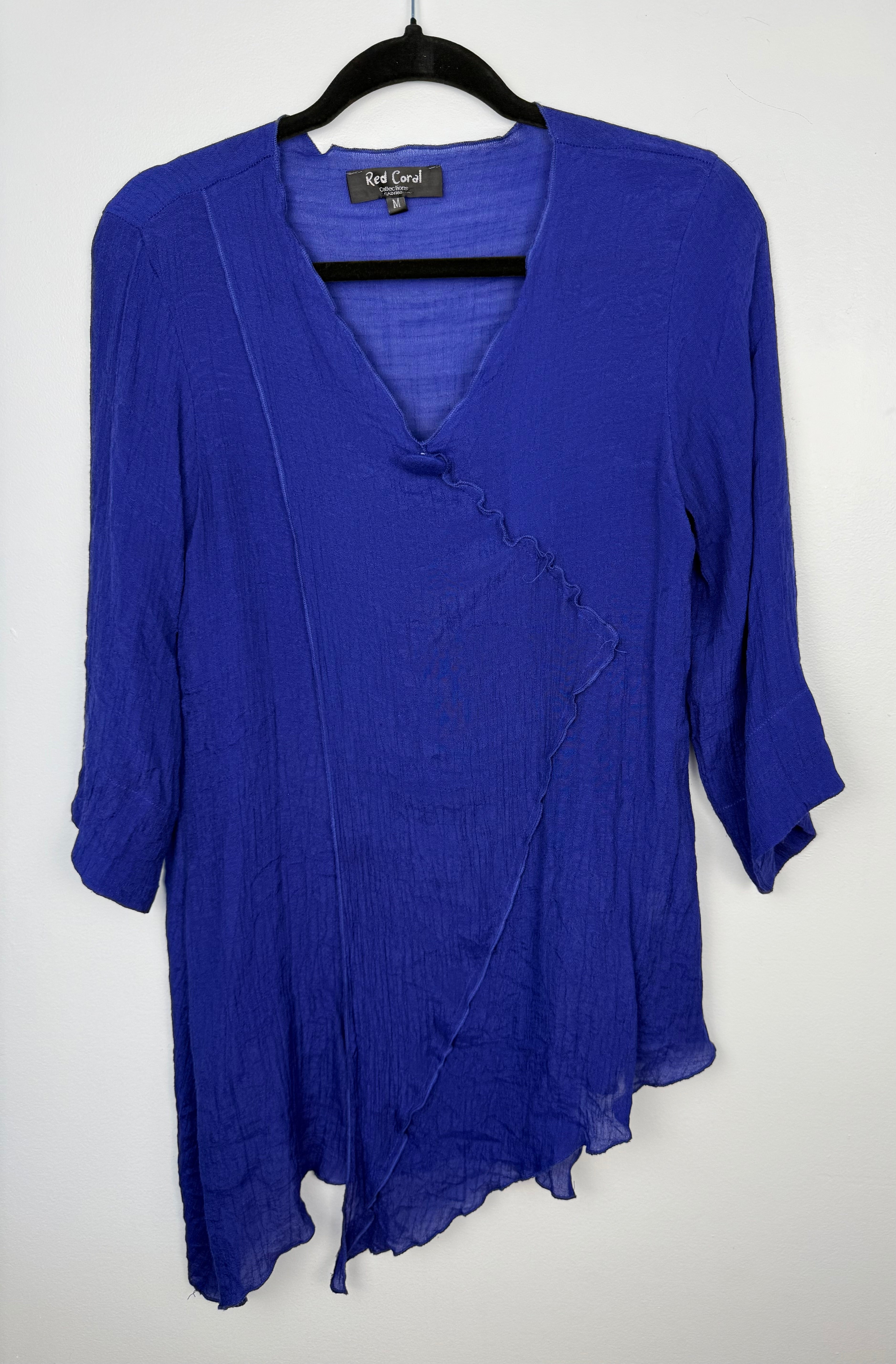 Red Coral Royal Blue Asymmetrical Tunic Top  on hanger