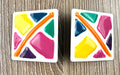 retro art deco earrings on table 