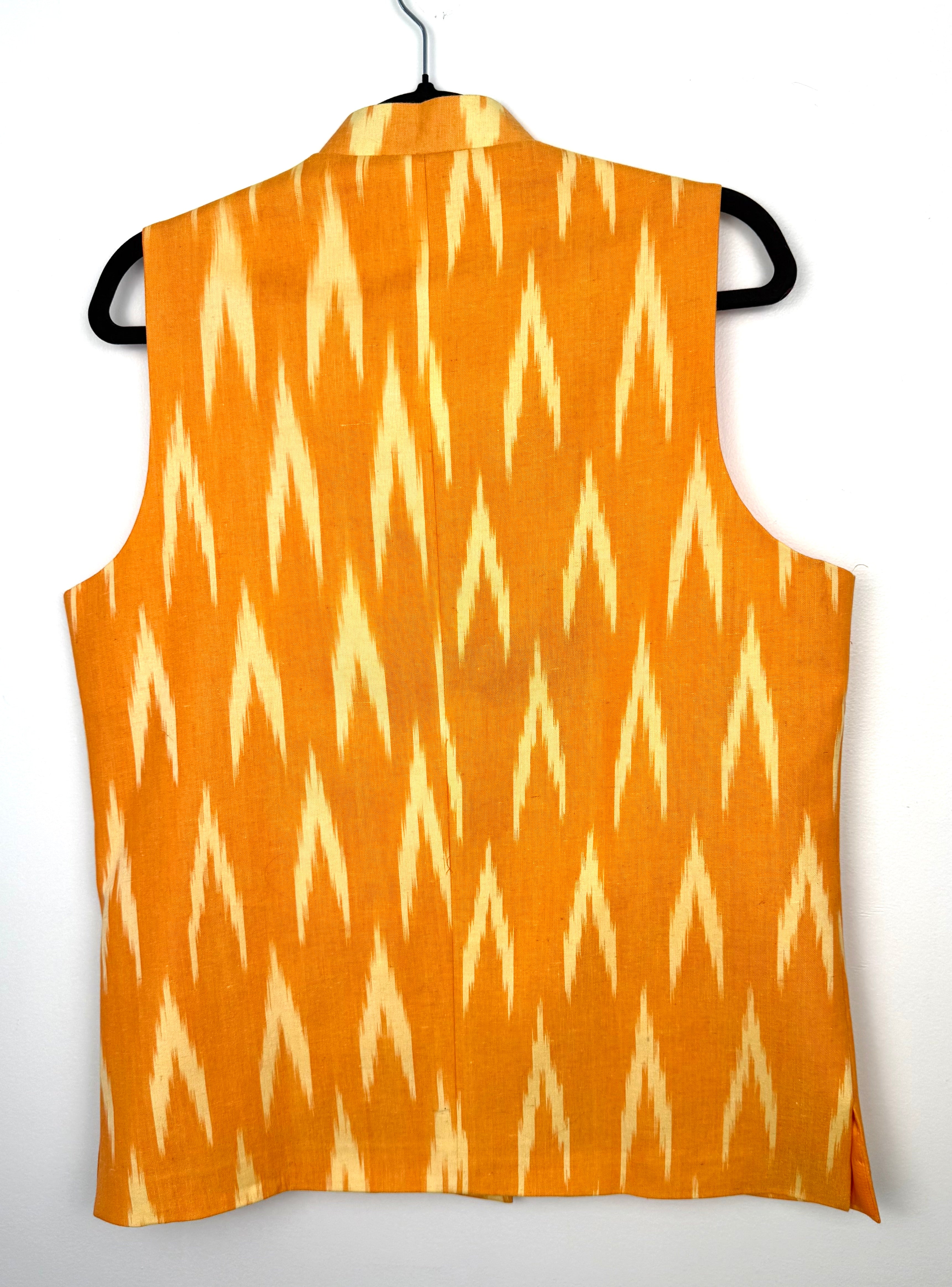 back view of Retro orange patterned waistcoat / womens retro ikat patterned vest 
