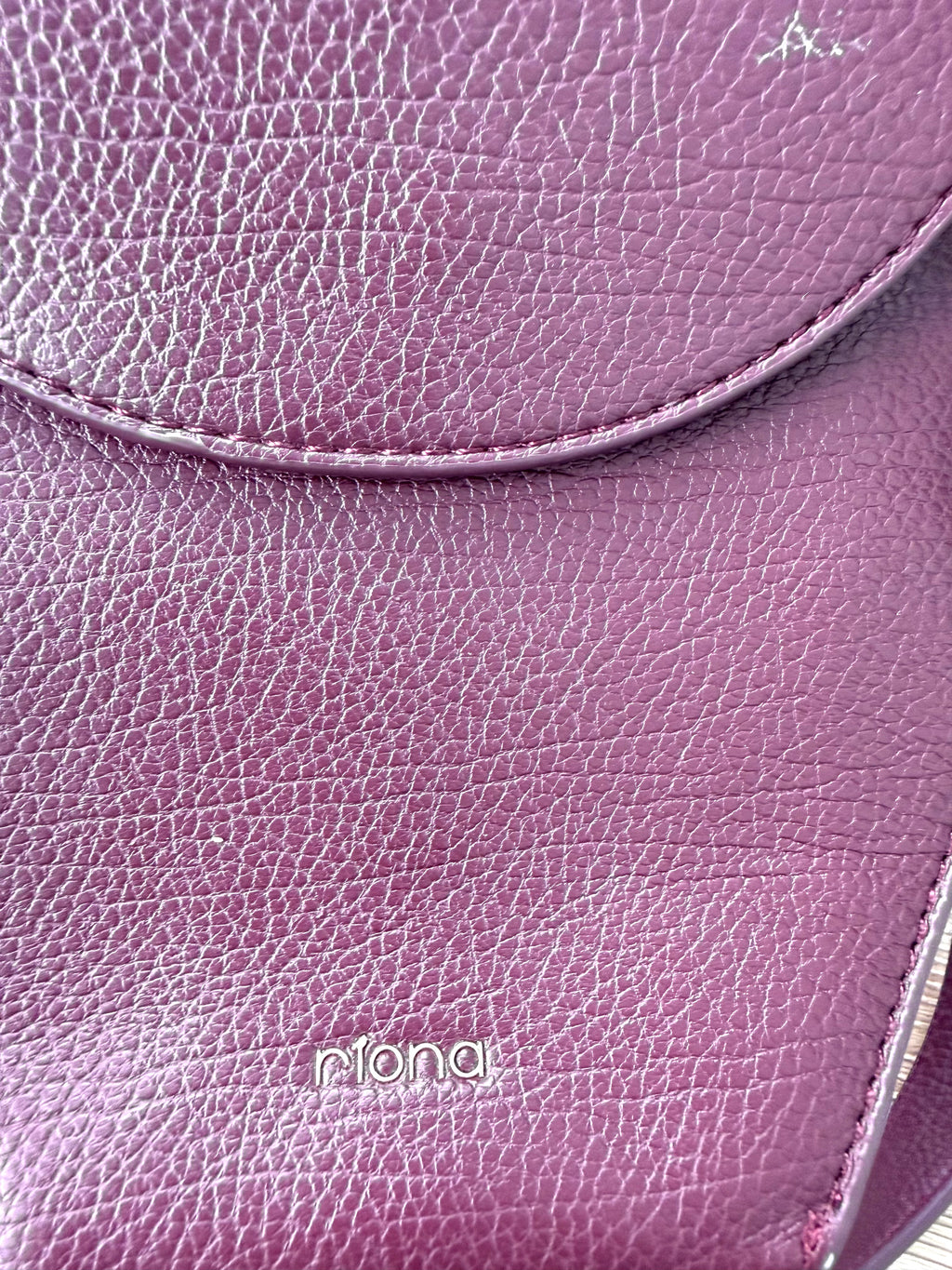 Riona Mini Crossbody Bag  at Blue Sparrow Shop close up of name on front