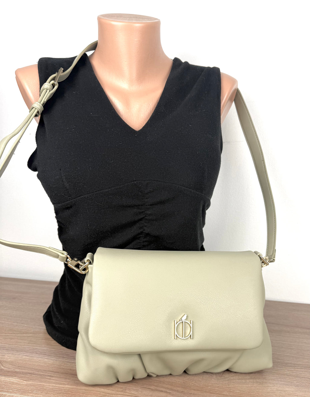 Riona Sage Green Crossbody Bag | RFID  protection travel purse  on mannequin 