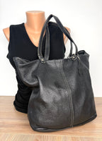 Roots Canada Black Pebbled Leather Tote bag  on mannequin to show size 