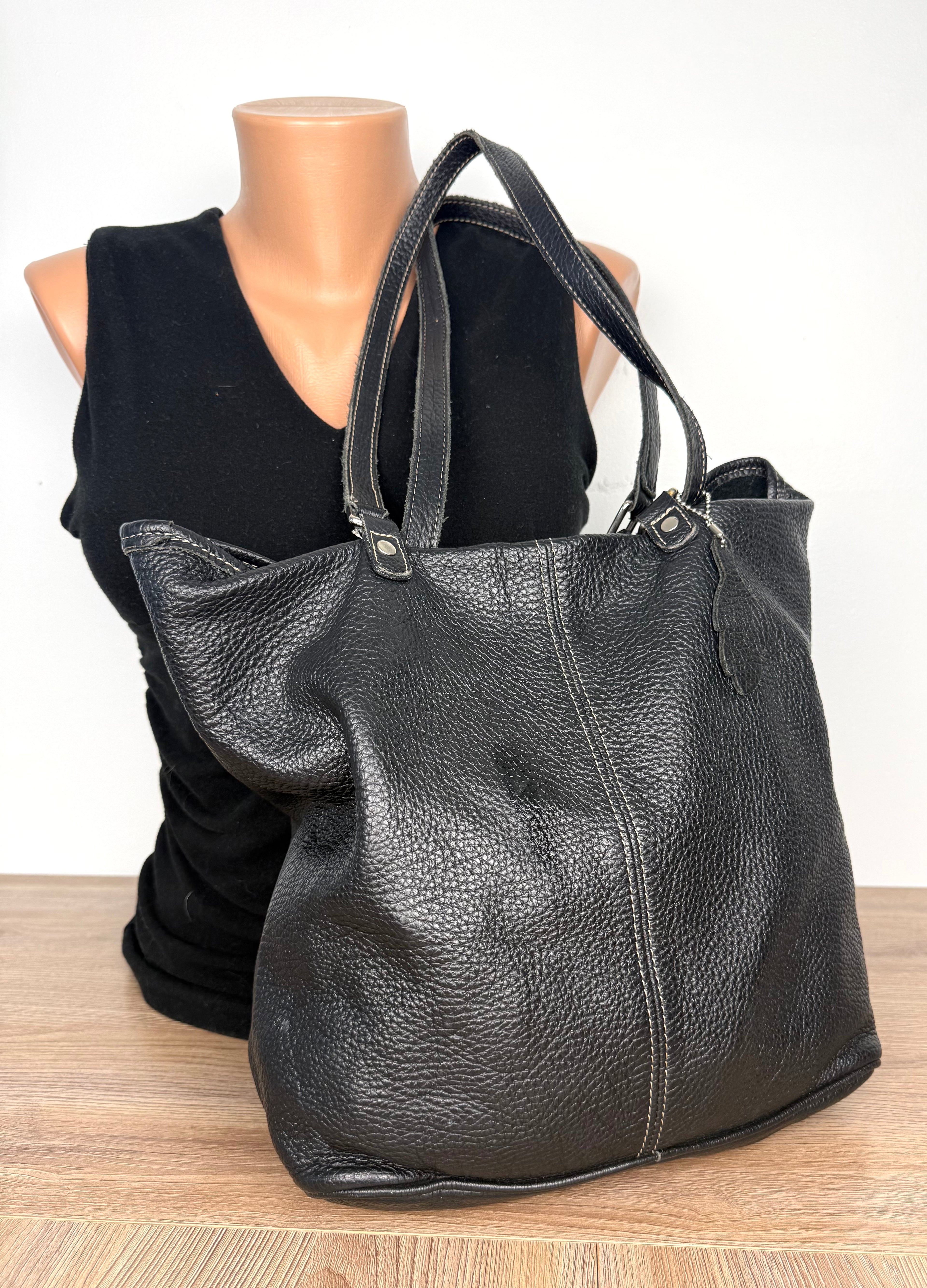 Roots Canada Black Pebbled Leather Tote bag  on mannequin to show size 