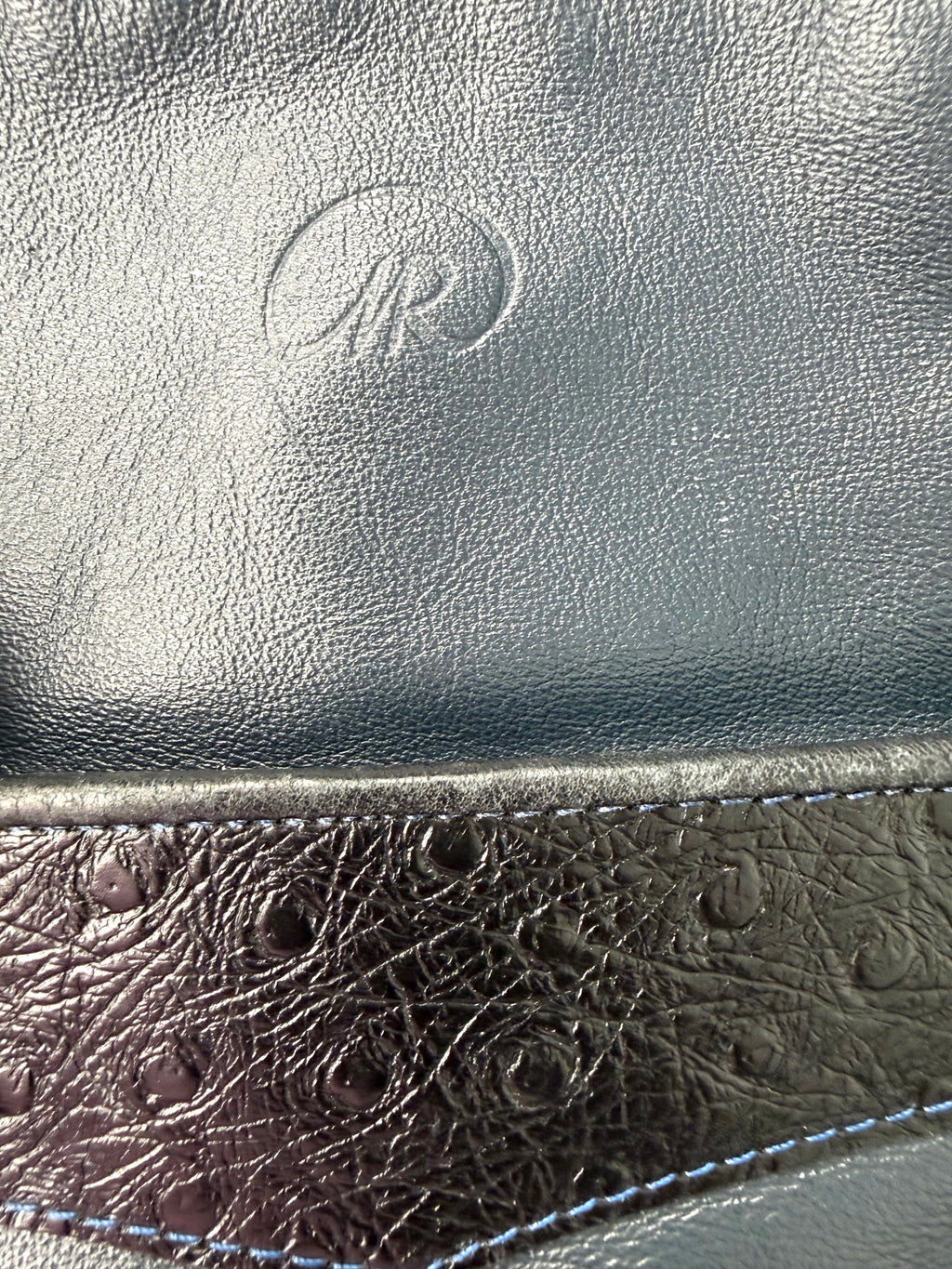 Rowland Leather logo on front of Vintage Rowland Leather Shoulder Bag in Navy Blue 