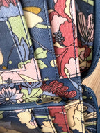 Sakroots Floral Crossbody Phone Wallet  showing inside paper money section, cards and zipper 